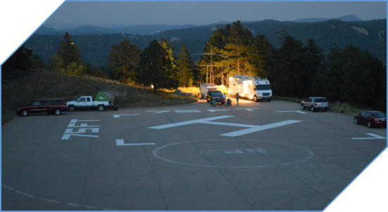 ARES
                              communications setting up at overflow
                              parking lot and helipad near Mt Rushmore